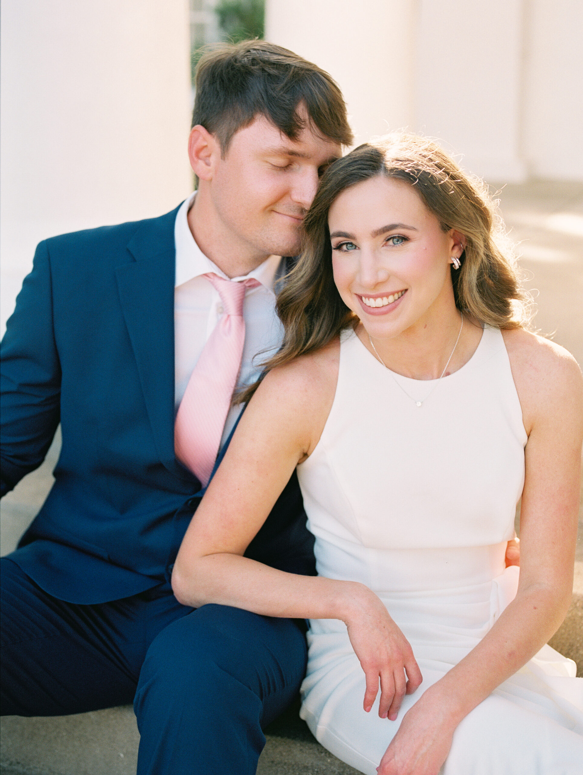 The sun setting over Arlington Hall, casting a golden hue across the park